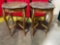 Victorian style side tables with marble tops and brass accents.