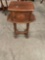 Antique little side table with intricate designs.
