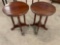 Lot of two vintage round end tables with pedestal base and intricate designs on the wood.