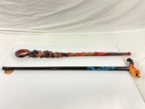 pair of animal designed wooden walking canes,