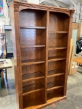 Beautiful bookcase with lights and center glass.