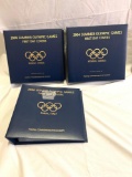 Set of three binders W/Olympic games first day covers stamps