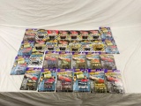 Collection of Johnny Lightning and Racing Champions sealed cars.