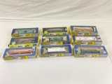 Collection of AHM HO scale train cars in original boxes. various conditions.