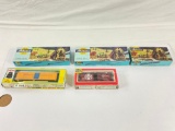 collection of Athearn, Atlas and Life Like boxed train cars.