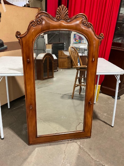 Nice Wood framed hall/entryway mirror with beveled glass and hat pegs.