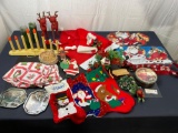 Assorted Christmas Decorations, Stockings, Various Santa Hats, and more