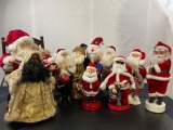 10 Assorted Santa Figures, one with rocking chair