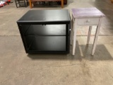 Black entertainment center with nightstand.