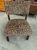 Animal print velveteen side chair.