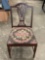 Vintage wooden chair with floral embroidered seat