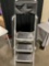 Step ladder with tool belt attachment.