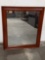 Wall mounted mirror with wooden frame