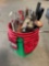 Bucket of tools with tool belt.