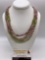 Multi-Strand polished stone necklace with 925 clasp.