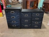 Black wood and nylon storage cabinet with drawers.