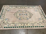Large Area rug with floral pattern's.