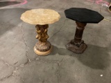 Set of two pedestal style stands one with cherub base and marble top one with granite top.