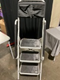 Step ladder with tool belt attachment.