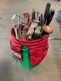 Bucket of tools with tool belt.