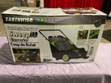 Earthwise Sweepit Model Lawn sweeper in box.