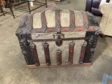 Antique Martin Maier Co. Steamer trunk with dome top lid.