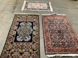 Set of three throw rugs one from the Taba Collection.