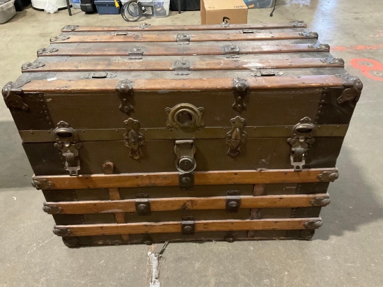 Antique Steamer trunk with wood slats and locking latchs.