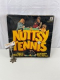 Vintage Tomy No. 7003 Nuttsy Tennis game in box. appears to all be there in good cond