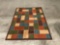 Wellington wool and synthetic rug, geometric square pattern, approx 5'x7'