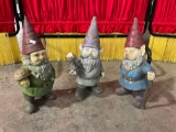 Three vintage metal garden gnomes