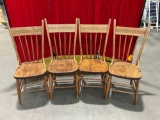 Four antique pressed-back plank-bottom late 1800s chairs