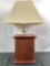 Modern reproduction clean Oak case Mission pedestal style table lamp w/ burlap texture shade