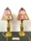 Pair of antique brass candlestick table lamps w/ brass and pink slag glass mission style shades