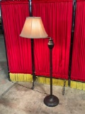 Brushed metal swing-arm floor lamp