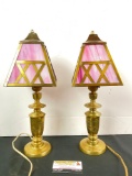 Pair of antique brass candlestick table lamps w/ brass and pink slag glass mission style shades