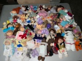 Huge assortment of Cabbage Patch Kids, Porcelain dolls, beanie babies and more see pics