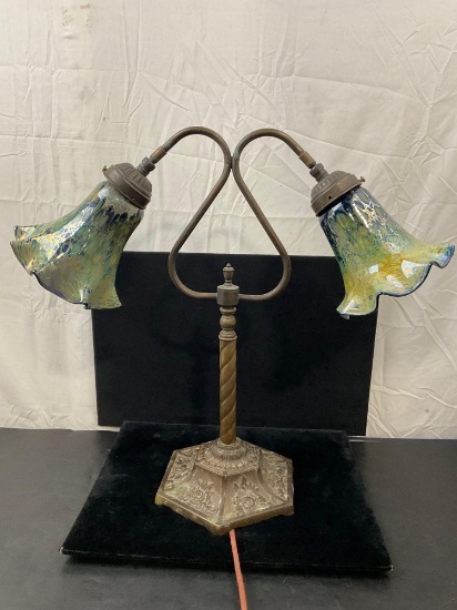 Antique Tiffany style double arm table lamp w/ ornate cast brass base & iridescent glass shades