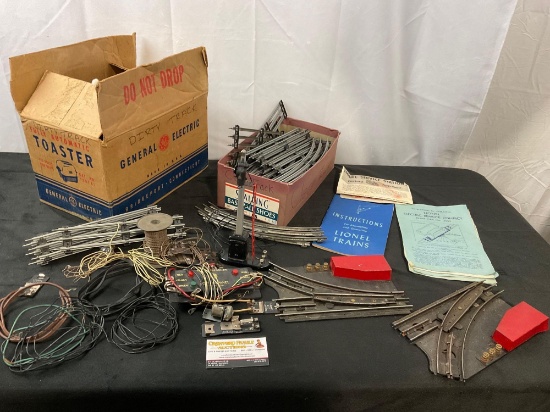 Assorted Lionel Electronics, 40+ pieces of track, Manuals, switches, and more