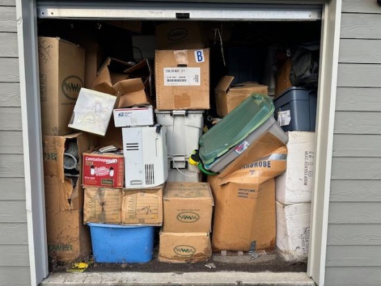 Unit 5 is a 10x15 stacked to the celling, looks like dolls, clothes , house hold & NIB items , tools