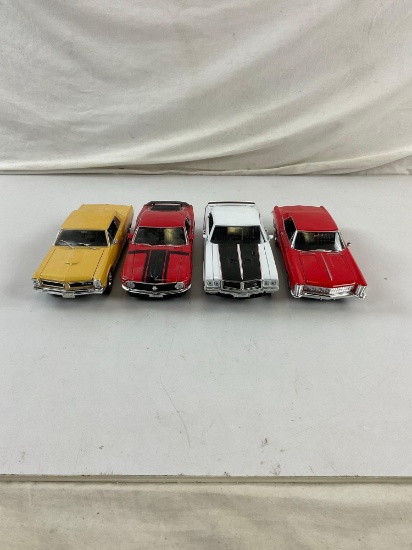 Collection of 4 Die Cast Metal Replica Muscle Cars 1/24 scale incl. 65' Buick Riviera, 65' GTO...