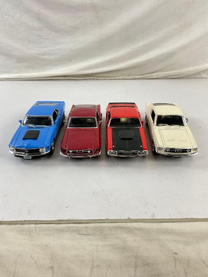 Collection of 4 Die Cast Metal Replica Muscle Cars in 1/24 Scale incl. 70' Mustang Boss 329..