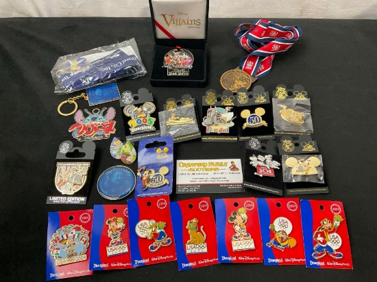 Assorted Disneyland Pins about 20, mostly USA 2004 Olympics, including a brass Medal