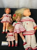 Set of 4 Vintage Dolls, a couple Shirley Temple Dolls, a couple with Red/White Dresses