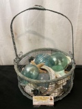 Vintage Wire Basket filled with Ocean themed Decor Items, Glass Floats, Shells, Starfish and more