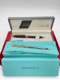 Tiffany & Co. gold and silver tone writing pen & Colibri Le Grand tortoiseshell pen in boxes