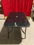 Nice Tempered Glass Metal Patio Table - In good Condition - Matches lot 54