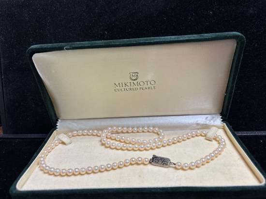 Vintage strand of Mikimoto Pearls w/ sterling clasp , original box and receipt from early 1970's