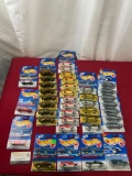 Asst. Hot Wheels Diecast Cars, in packaging, 4 Patterns of Dodge Ram 1500 & more, 34 pieces