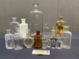 Variety of The Owl Drug Bottles, approx 15 pieces, varied sizes, largest is about 8 x 3 x 2.5 inc...